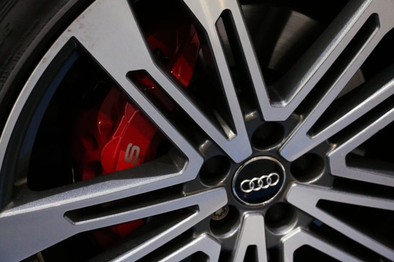 Close up of the wheels and brake callipers
