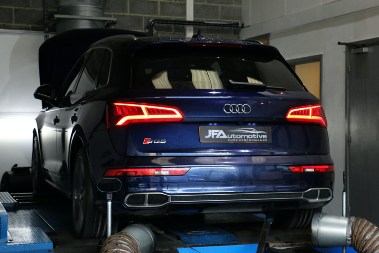 Car is running on the dyno, taken from the passenger rear