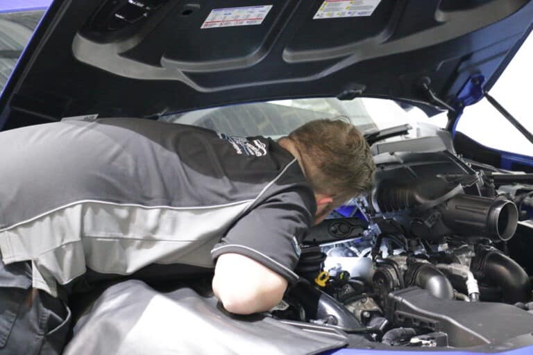 Blue_Alfa_Guilia_Quadrifoglio_Engine_Bay_Being_Worked_On