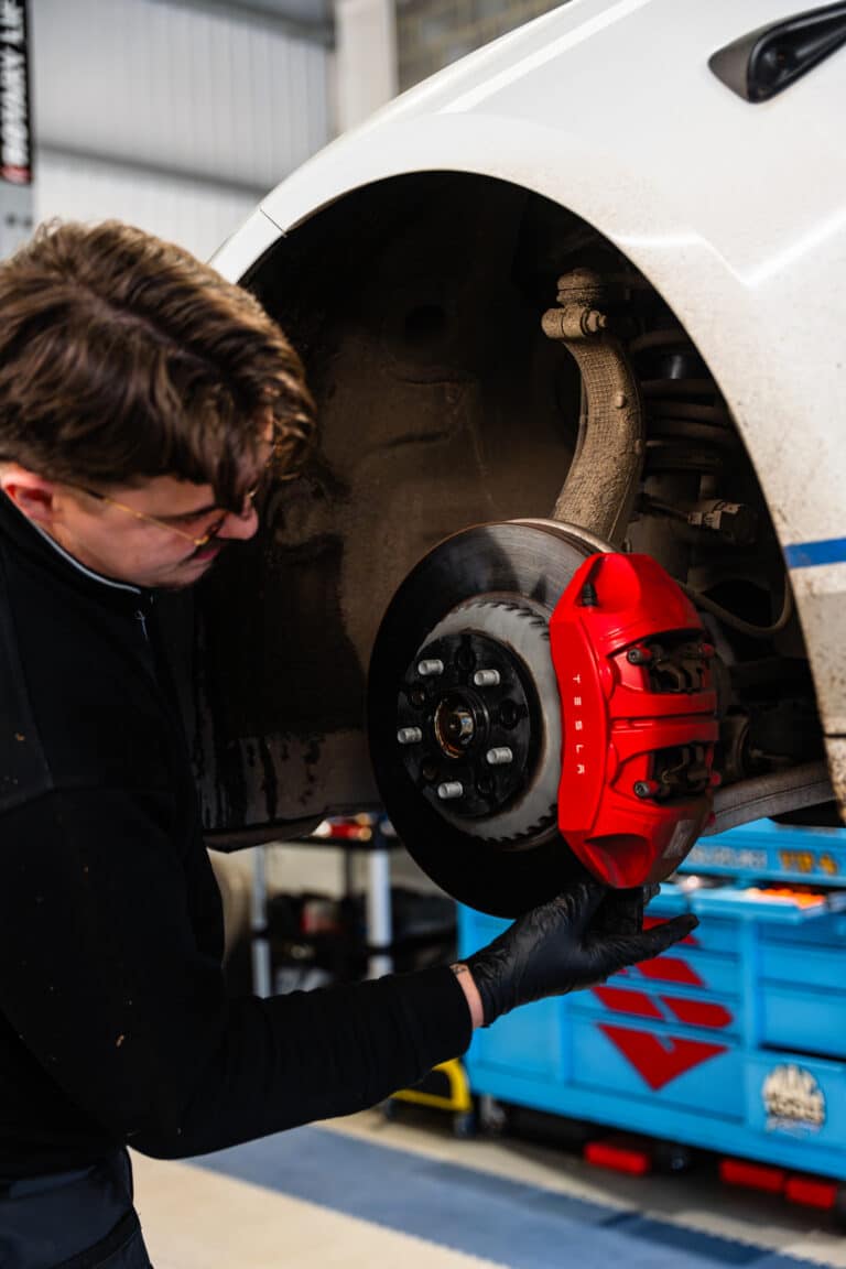 Working on the brakes at JF Automotive in Maidstone