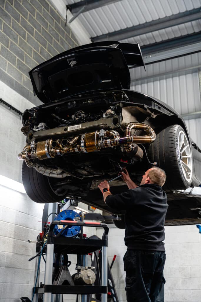 Porsche GT3 991 In workshop exhaust fitting