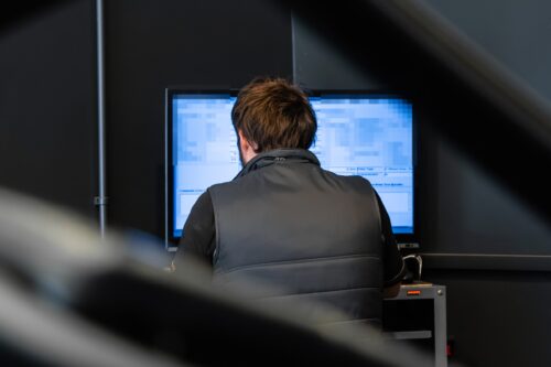 A JF Automotive technician reading and writing an ECU file at the workshop in Maidstone, Kent