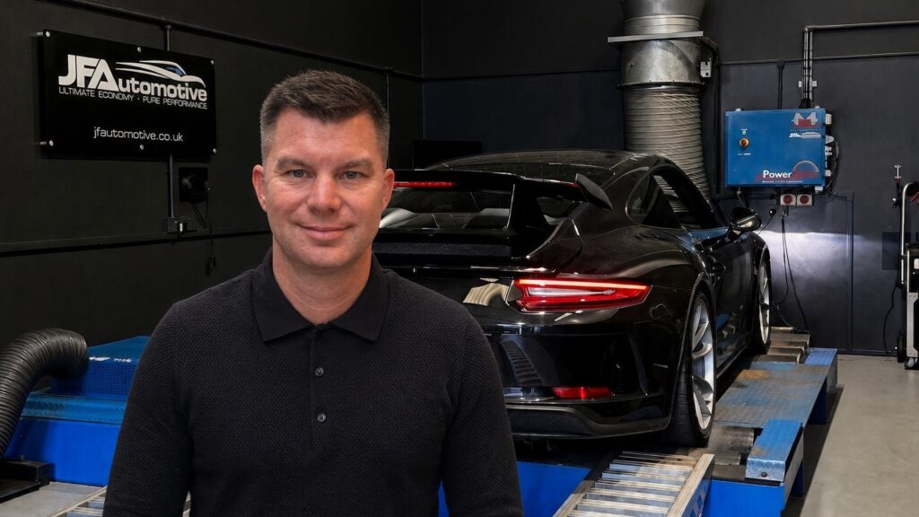 John Ford beside a Porsche 911 GT3 on the JF Automotive rolling road